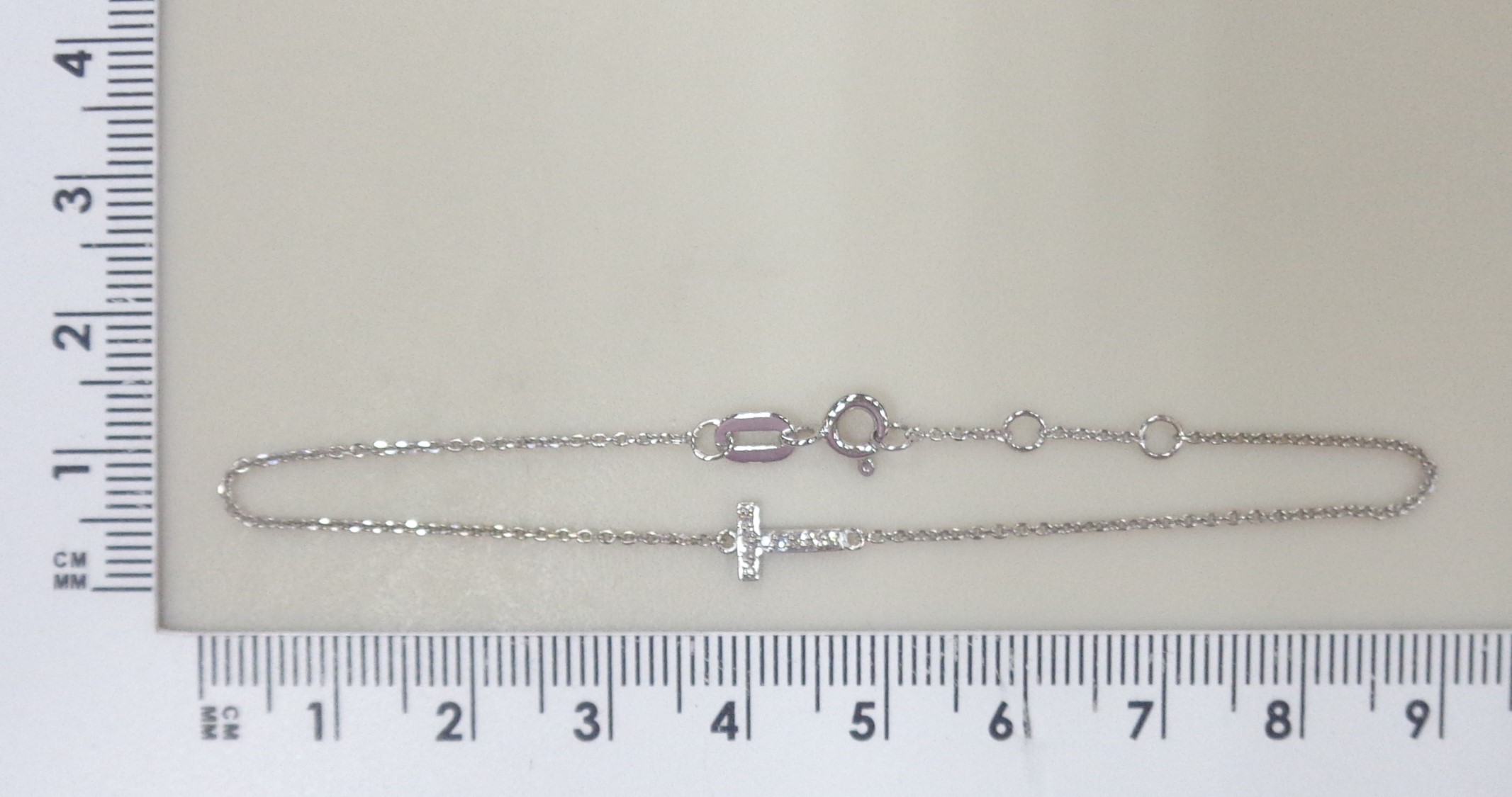 Браслет из белого золота с бриллиантами "Т"